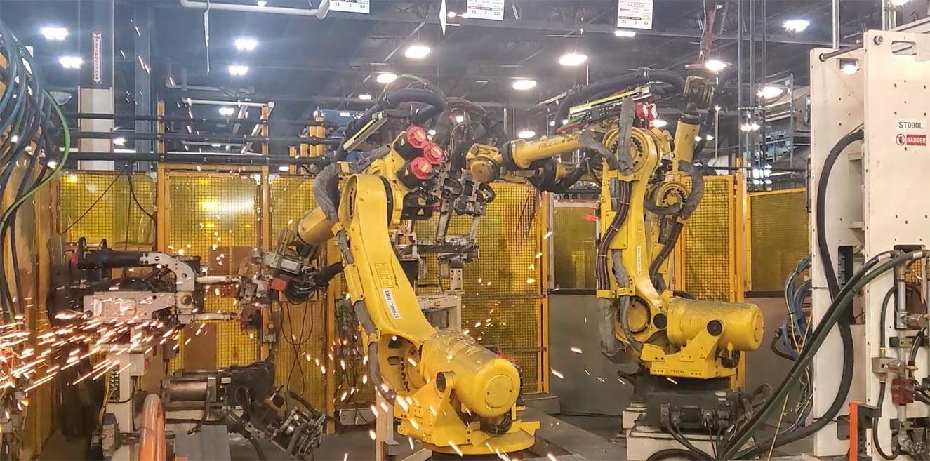 Robots welding automotive parts