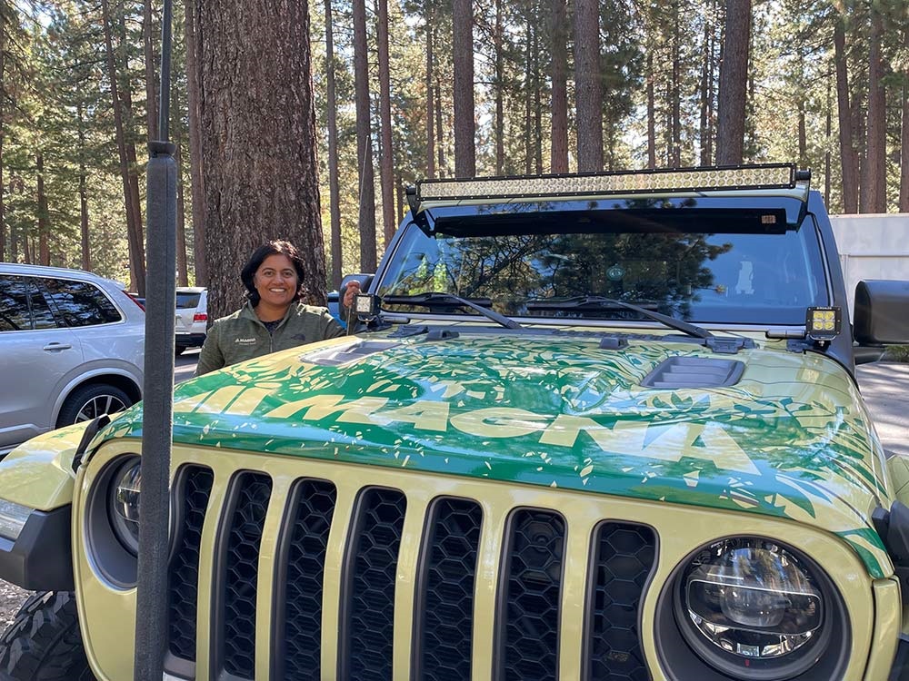 Sree Anandavally standing beside Jeep® Gladiator Rubicon