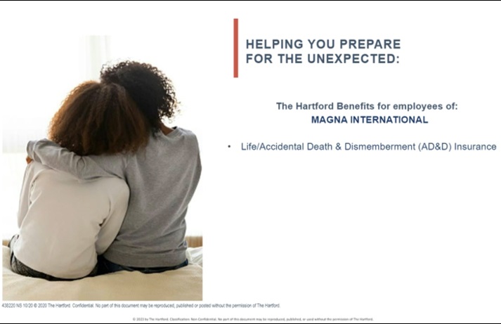 Two people sitting with one person with their arm around the other person's shoulder