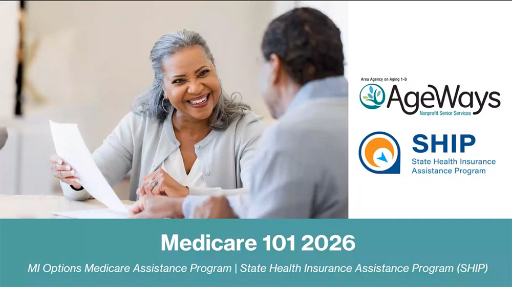 Two people discussing a document, one of them smiling