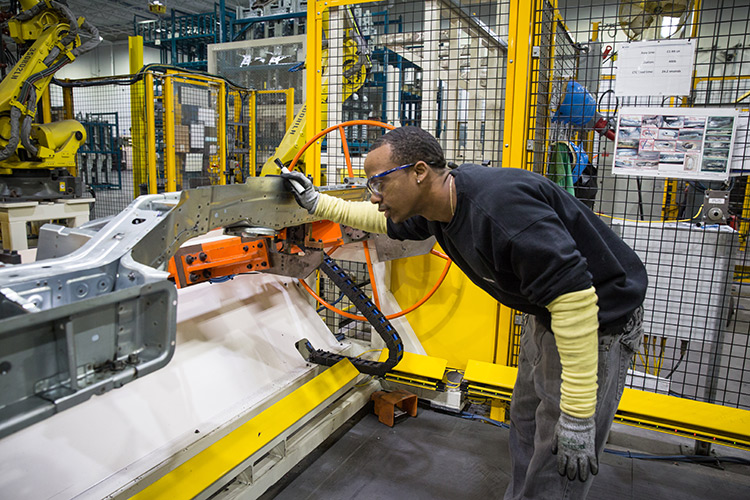 Person working in a manufacturing facility