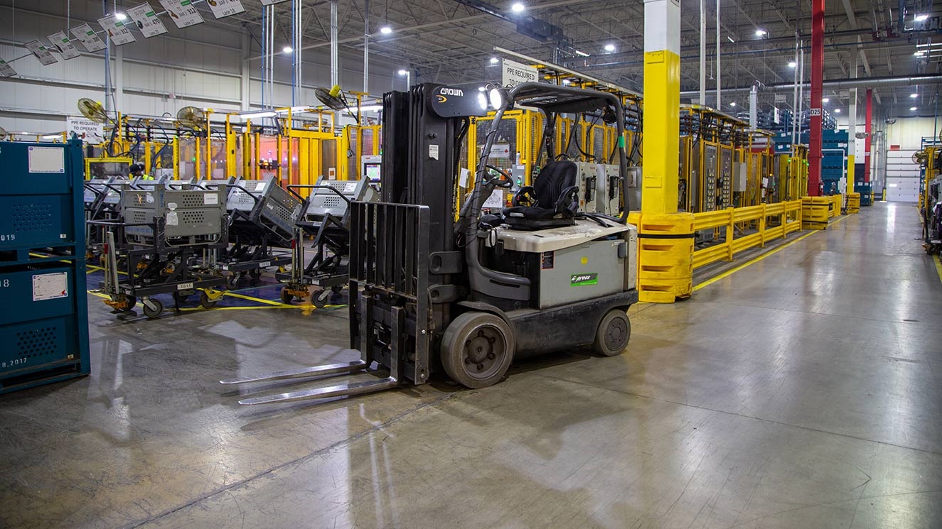 Forklift in an automotive parts manufacturing facility.