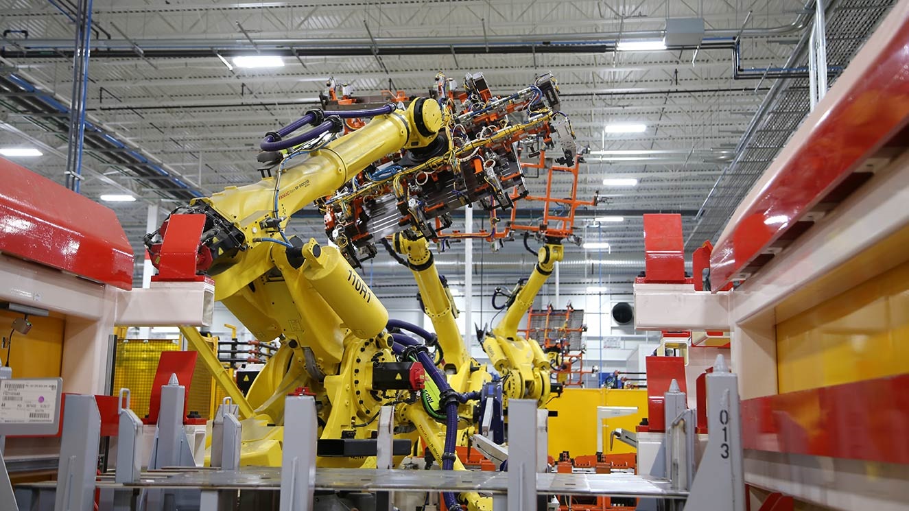 Robot in an automotive parts manufacturing facility