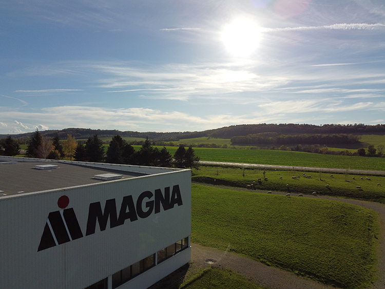 Magna Langres facility in Langres, France with the sun shining