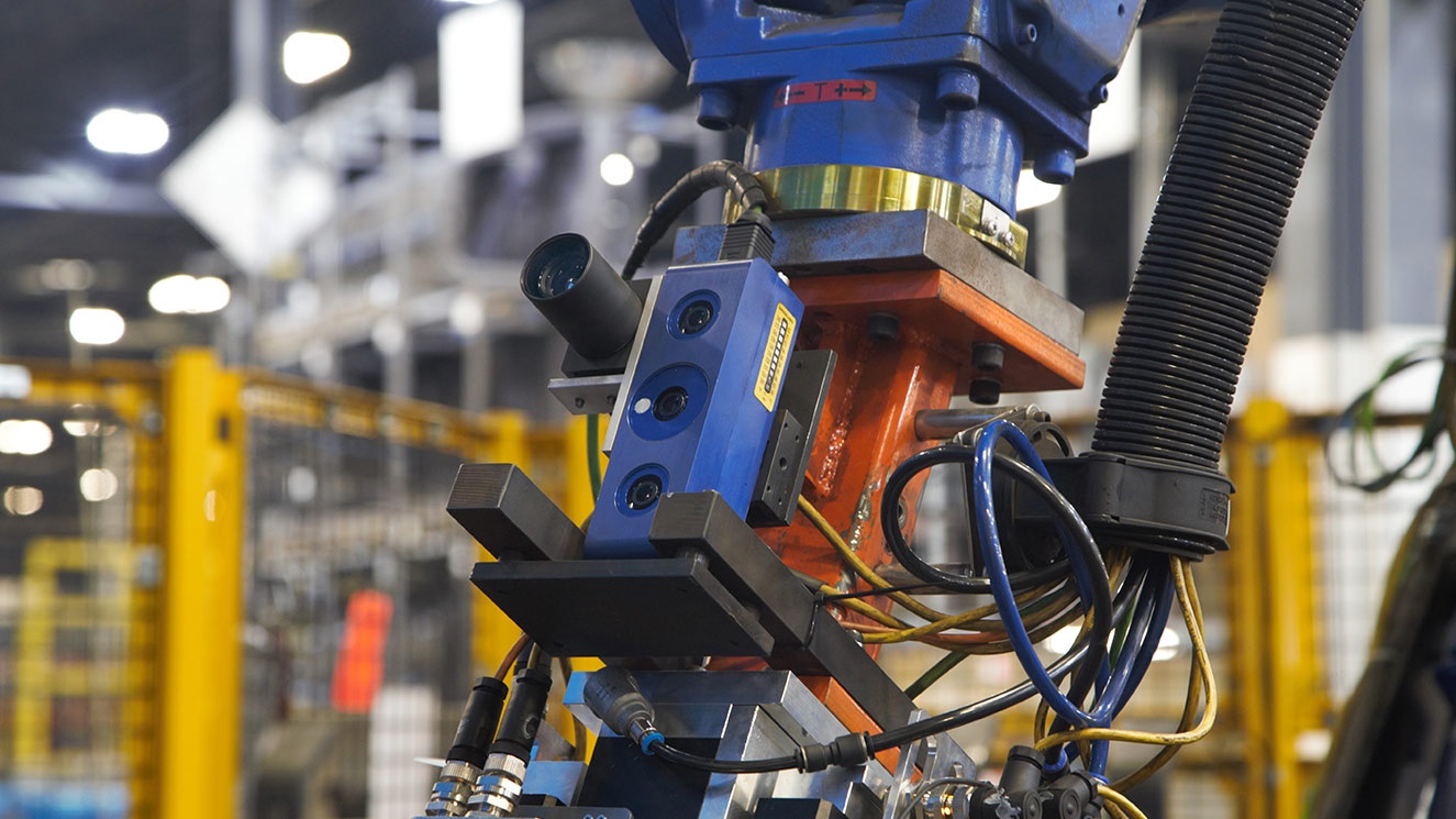 Close up of robot used for manufacturing automotive parts