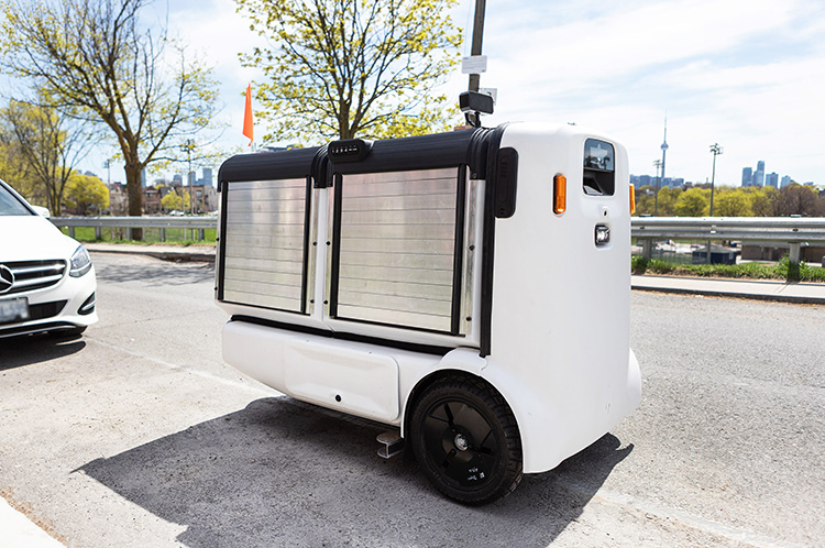 City delivery bot parked on a street