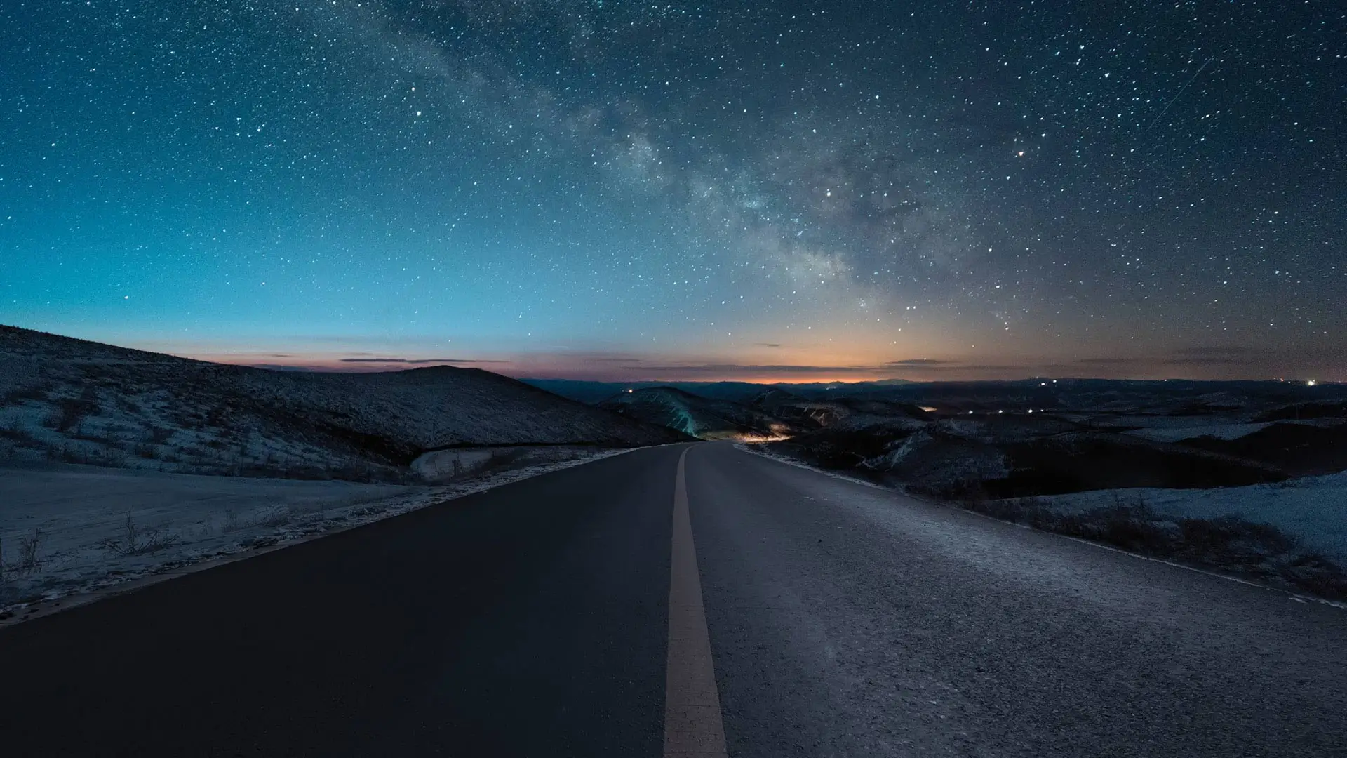 A beautiful empty road in a starry night