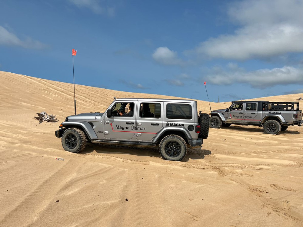 Two Jeep® Gladiator Rubicons driving along rugged terrain