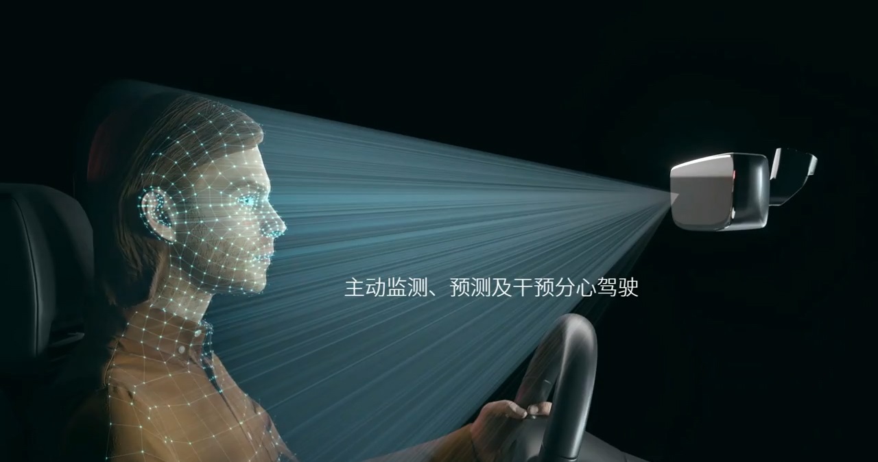 Person sitting in car showing how the driver monitoring system engages with driver