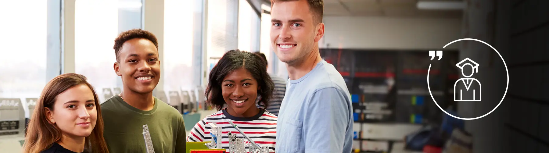 Group of people smiling in a classroom