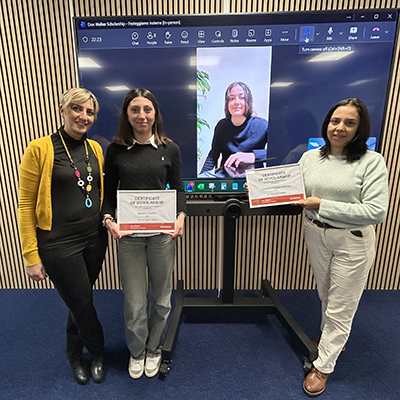 Beatrice Ballini and Carolina Padron receiving the Don Walker Scholarship Program Award
