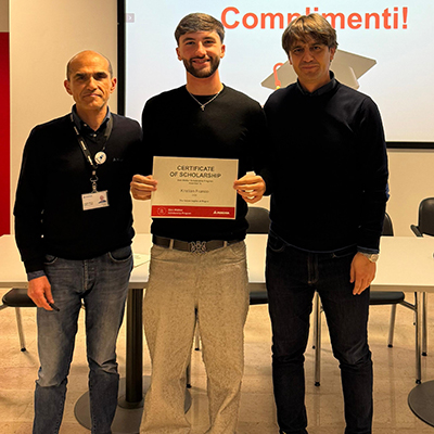 Kristian Franco receiving the Don Walker Scholarship Program Award