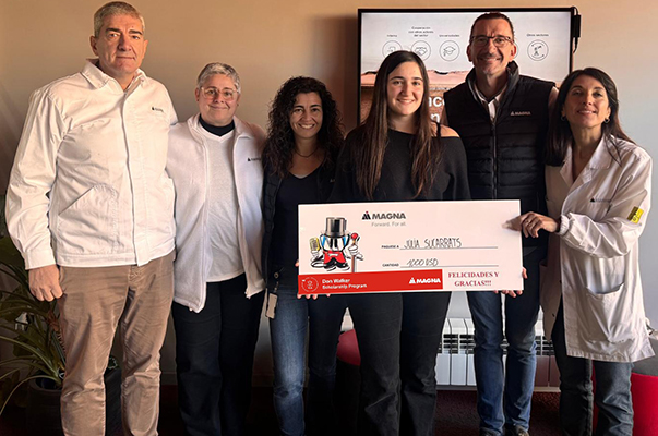 Julia Sucarrats receiving the Don Walker Scholarship Program Award