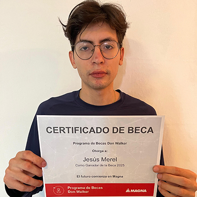 Jesus Angel Merel Castro holding the Don Walker Scholarship Program Award