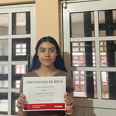 Raquel Pachicano Reyes holding the Don Walker Scholarship Program Award