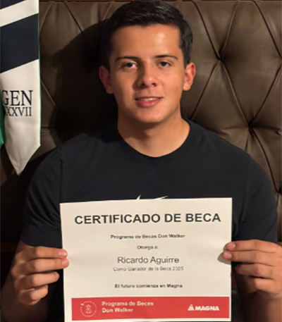Ricardo Aguirre Ramos holding the Don Walker Scholarship Program Award