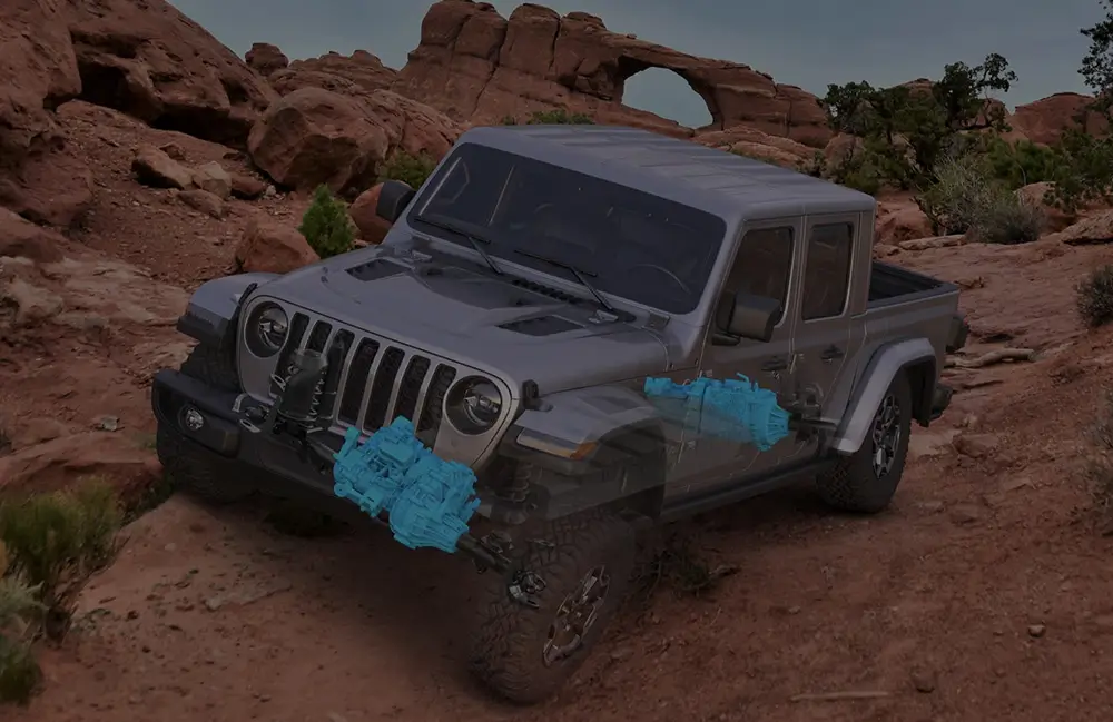 Jeep on rough terrain showing the location of the front and rear axles