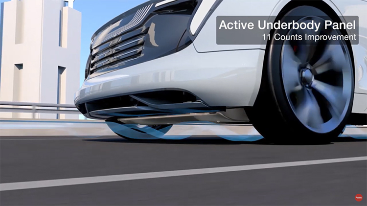Picture of the front of a vehicle driving down a road showing how the active underbody panel works