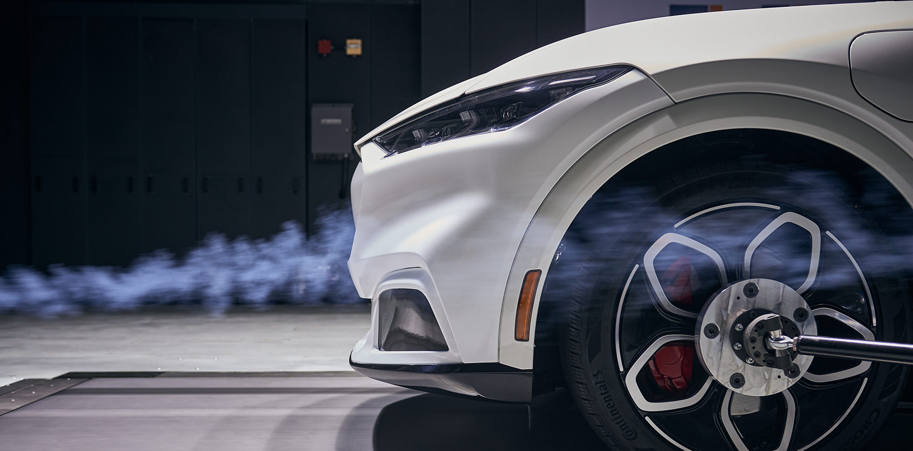 Grey vehicle being tested for the affects of wind travelling over the vehicle (aerodynamics)