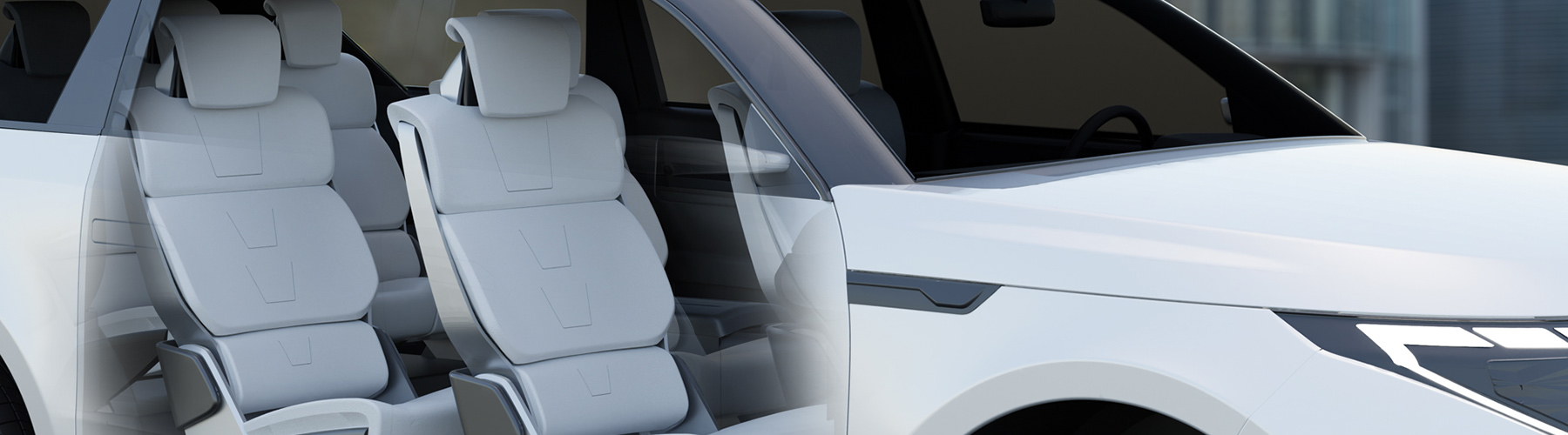 White vehicle showing seats