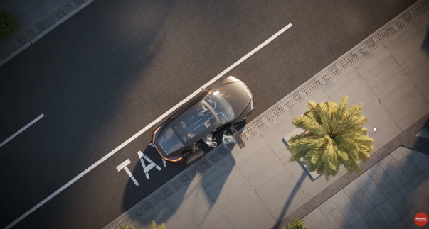 Overhead view of a person getting into a vehicle on the street