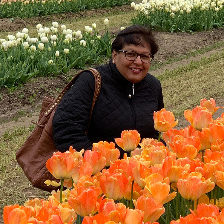 Anagha Wankar in a field of tulips in Holland