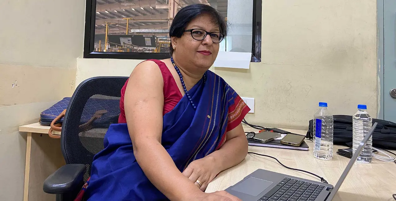 Anagha Wankar sitting in a office at the manufacturing facility