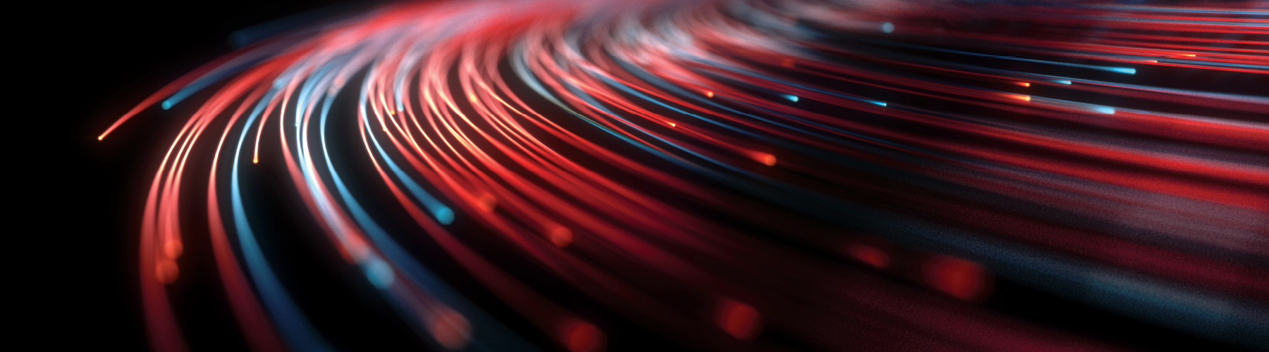 Picture with black background with red and blue streaking lights forming lines