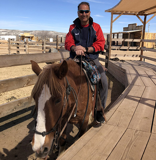 Michael Iannantuono riding a horse
