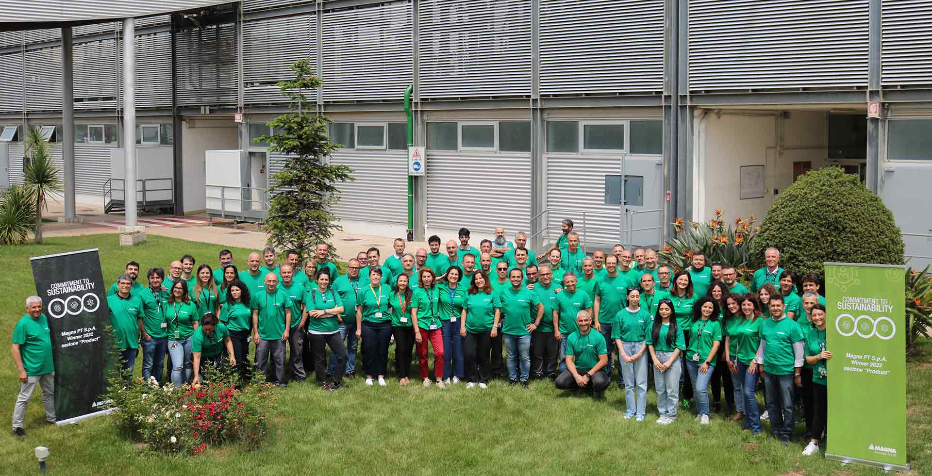 Group of people standing outside of the transmission plant in Bari, Italy