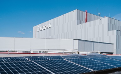 Exterior of Magna Steyr manufacturing facility with solar panels on the roof