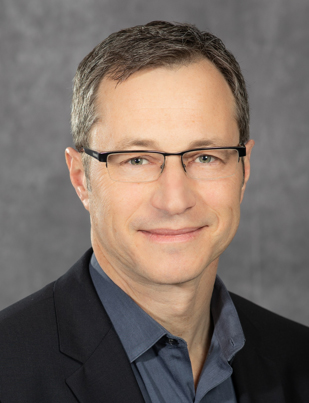 Portrait of Benjamin Saltsman, Director, Data Analytics, Simulation & IoT, Magna