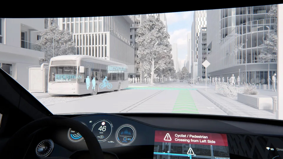 Animation showing the view from the driver with the in-vehicle screen showing cyclist/pedestrian crossing