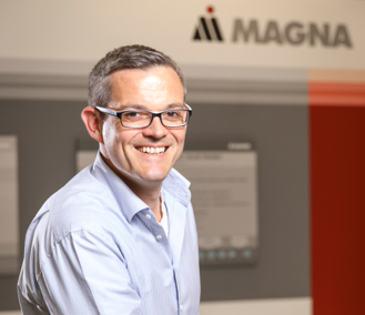 Head shot of David Ludwig, Sr. Director, Electrical System, Magna